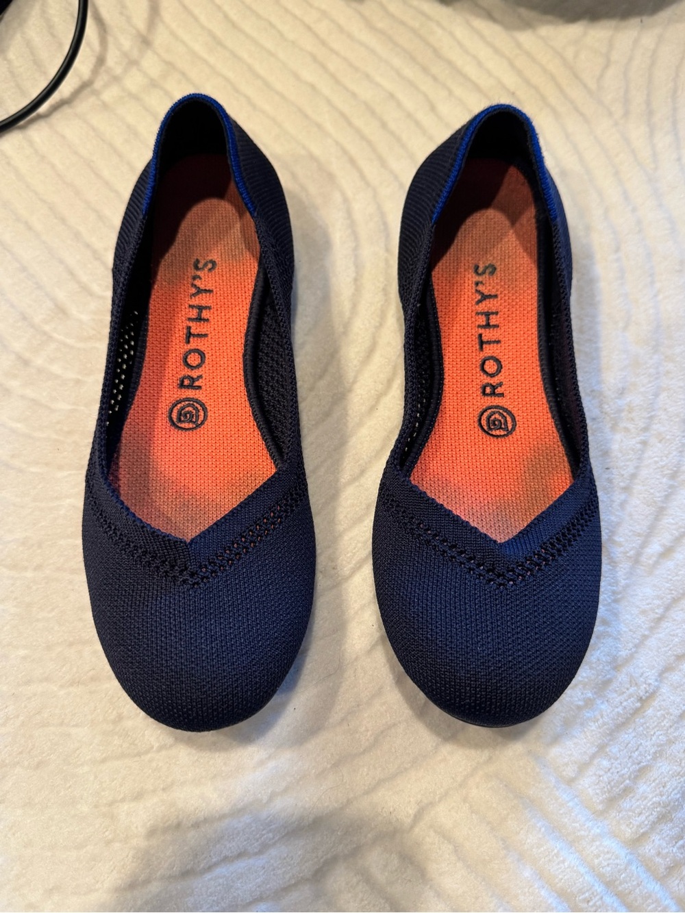 Rothy's Navy Knit Ballet Flat with Orange Insole